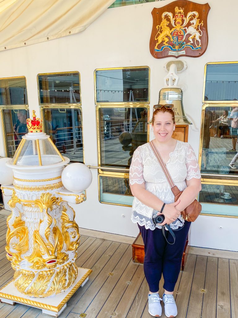 Author at the famous bell on the Royal Britannia