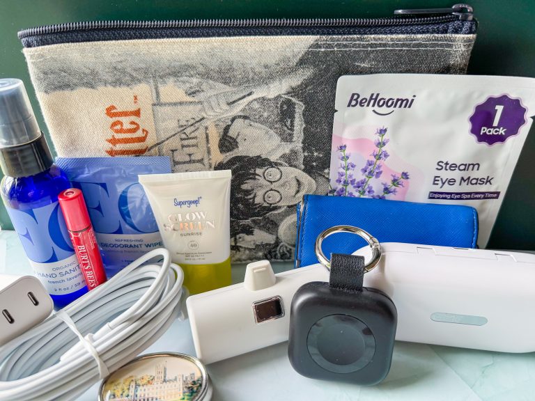 All of the items in front of the small bag