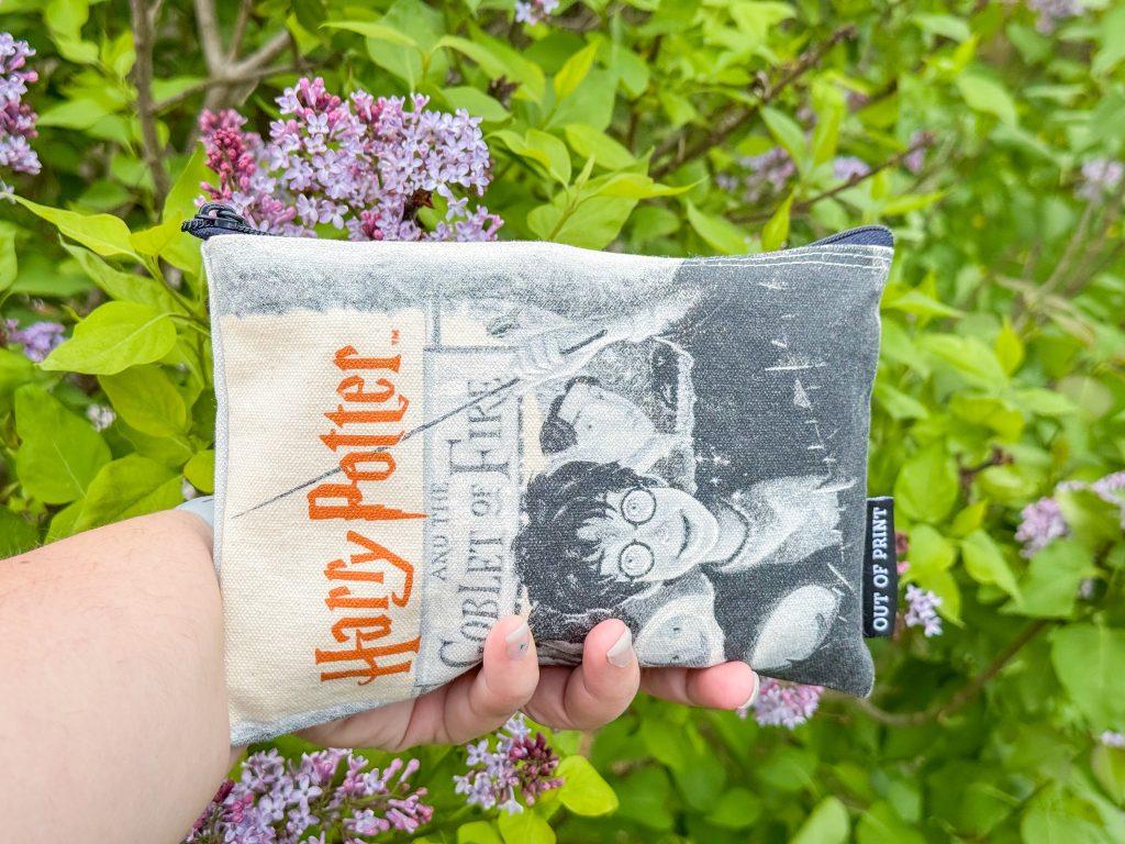 Small bag being used with lilacs in background